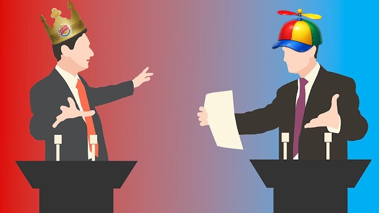 Two politicians wearing silly hats